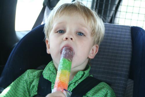 Wesley eating his BlueBell Rainbow pop.