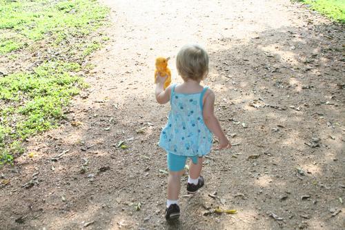 Running with her duck.