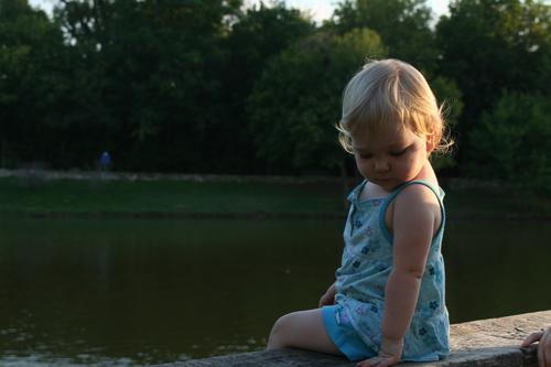 Now it is Jillian's turn to sit on the ledge.