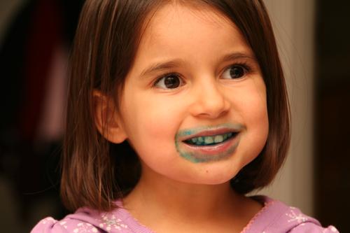 The blue frosting looked good on the kids!